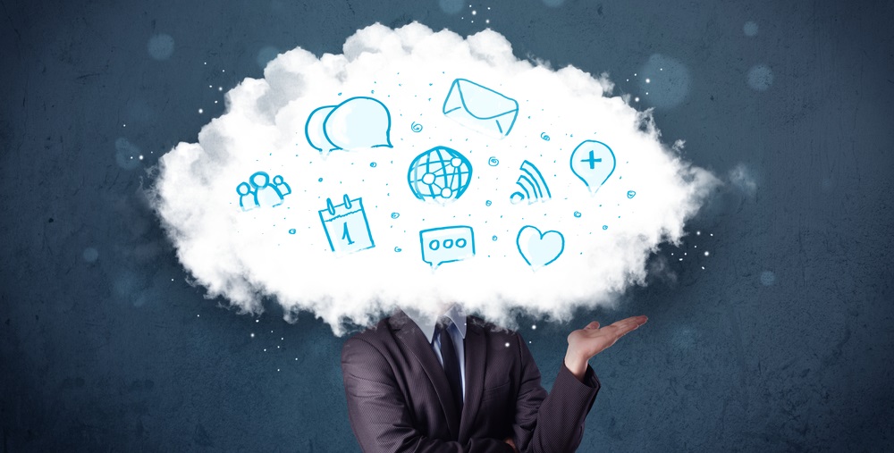 Man in suit with cloud head and blue icons on grungy background